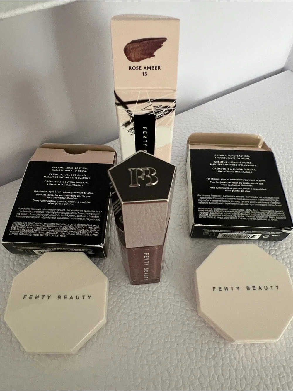 Fenty Beauty bundle deal! 2 mini Killawatt highlighter and Rose Amber Gloss Bomb